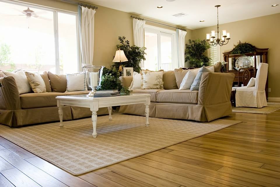 A living room filled with furniture and a coffee table
