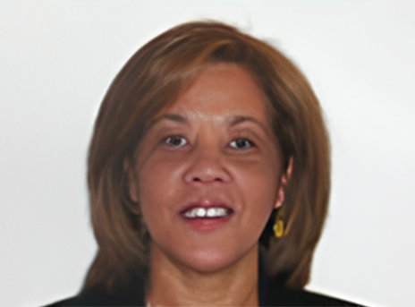 Portrait of a smiling woman with shoulder-length brown hair on a plain white background