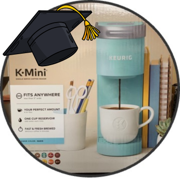 Black K-Mini coffee maker beside a light blue Keurig brewer with a graduation cap on the box