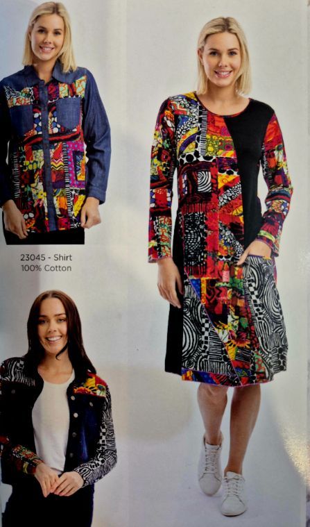 Women in colorful patchwork clothing: jacket and dress. White sneakers, smiling.