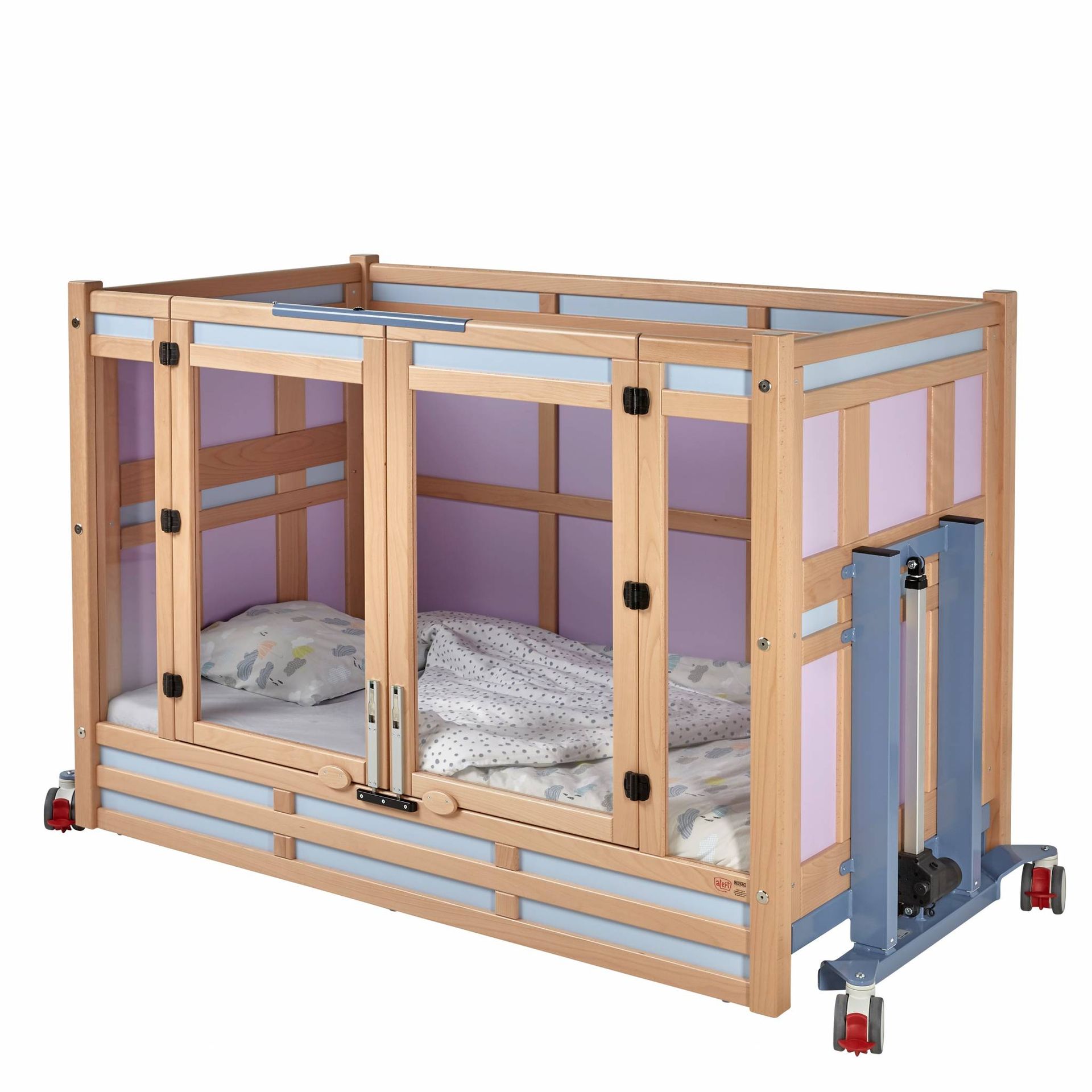 A wooden crib with a bed inside of it on a white background.