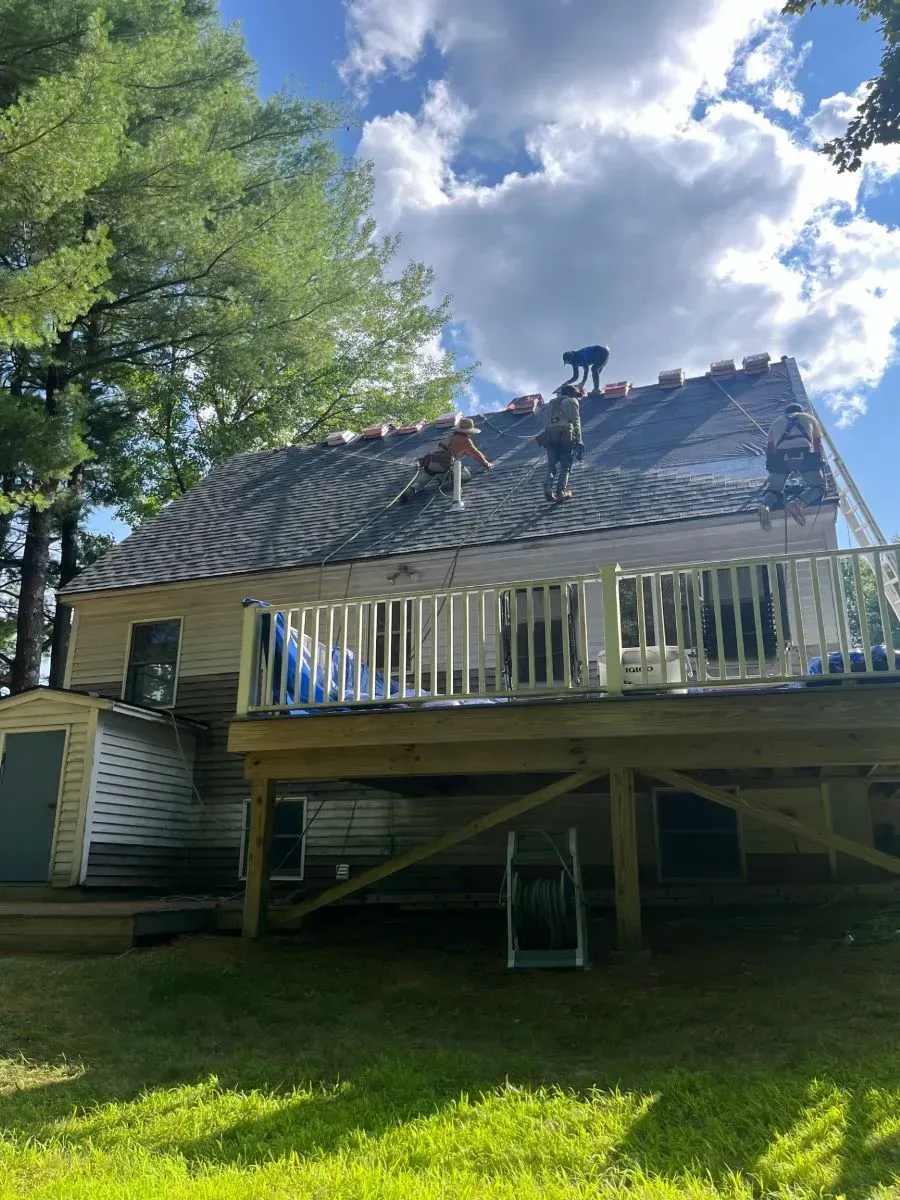 Roofing a home in  Maine