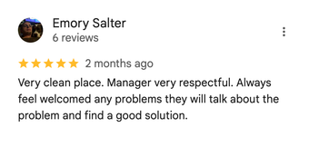 Google review by Emory Salter praising the clean laundromat and respectful manager
