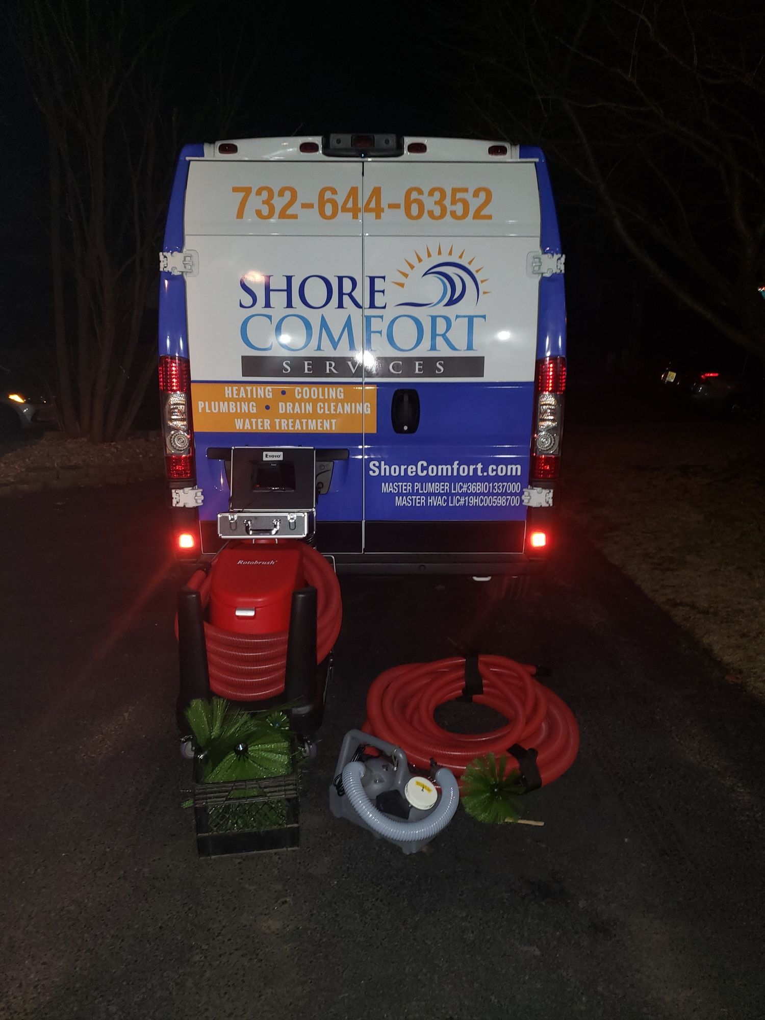 a shore comfort van is parked on the side of the road