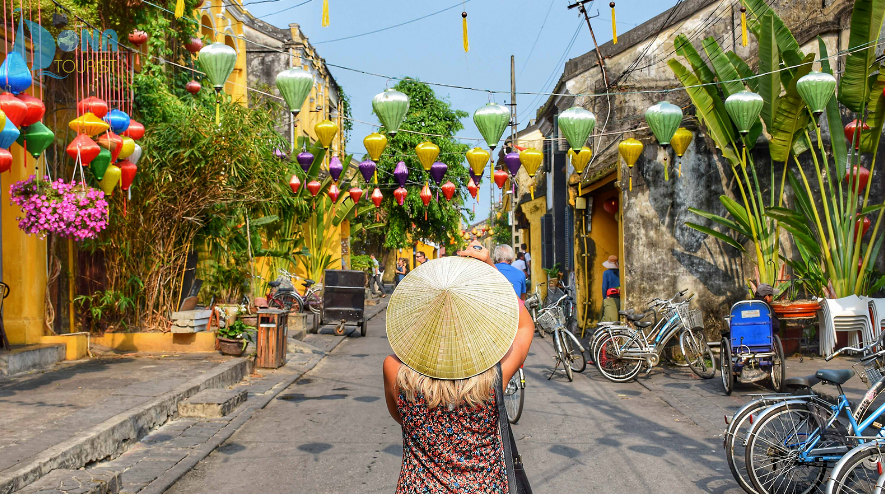 Hoi An ancient town street with colorful lanterns in Vietnam