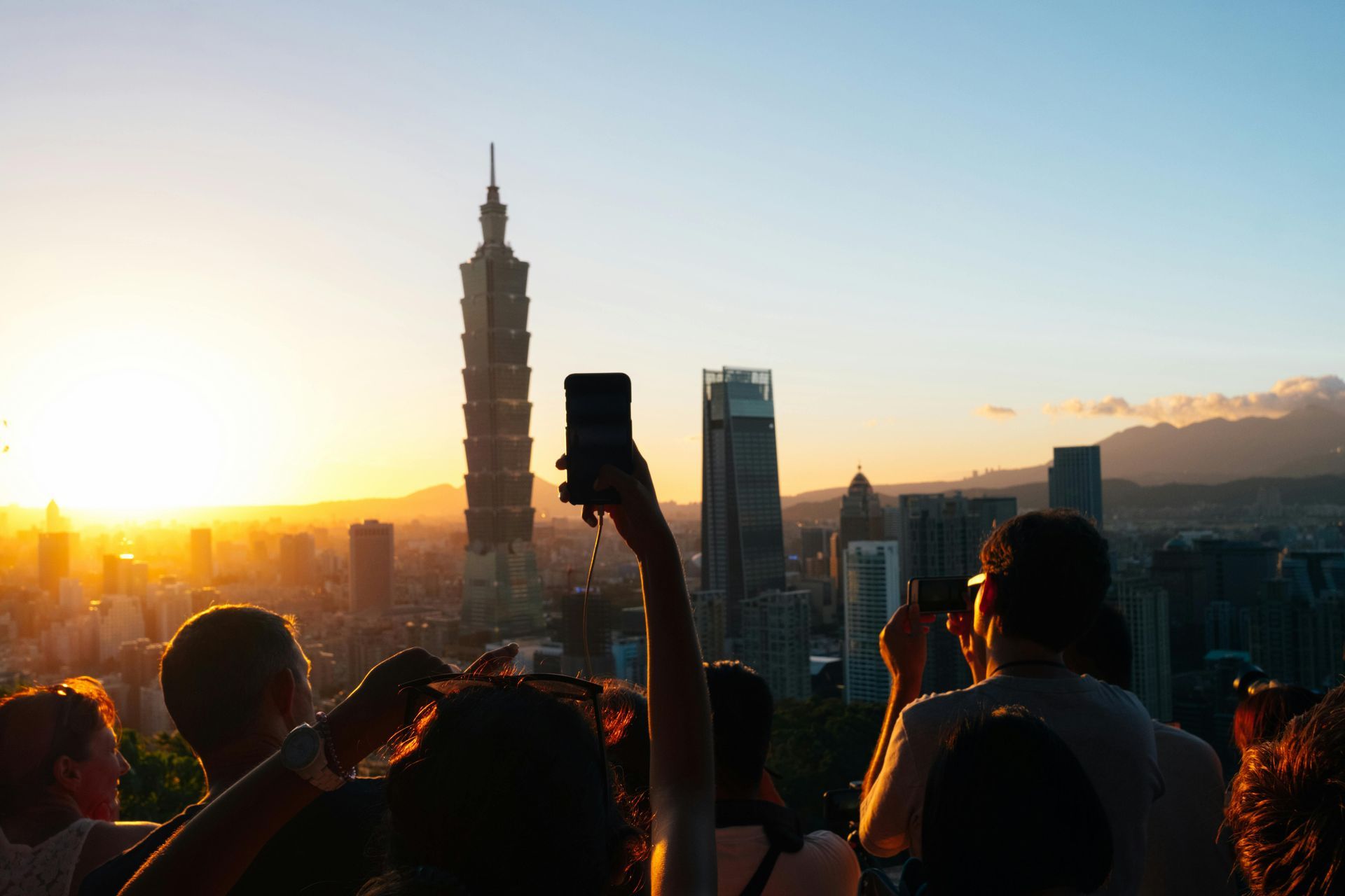 Taipei 101 skyline at sunset viewed from a scenic lookout