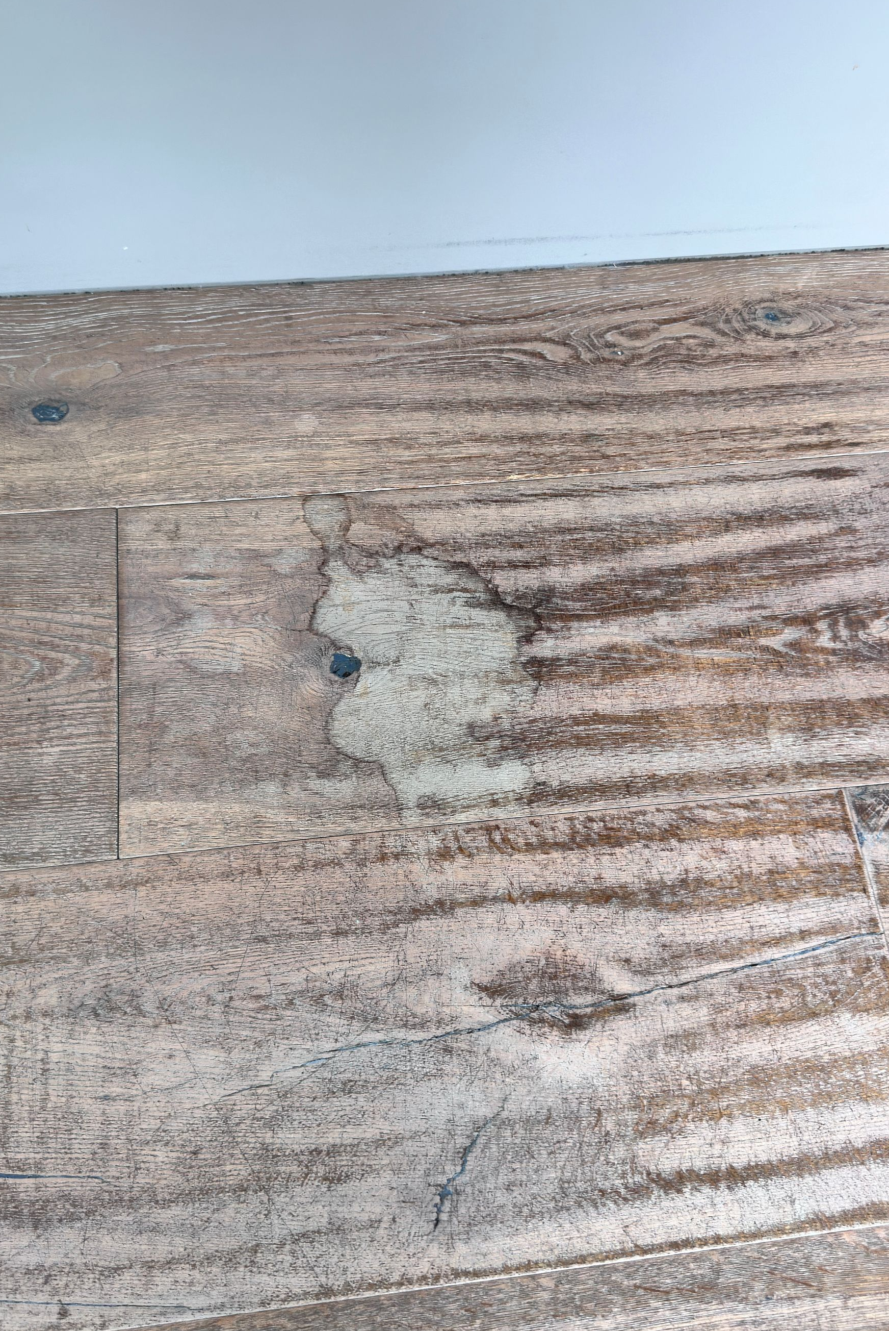 Engineer timber floor repaired — before and after comparison