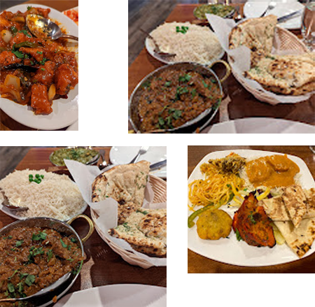 Indian dishes: rice, naan, and various curries in metal bowls on a wooden table.
