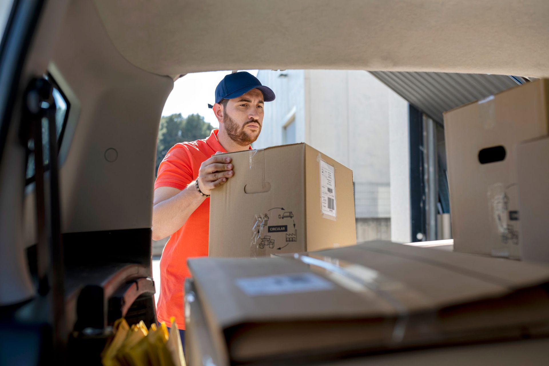 Delivery man in uniform | Dry Creek, SA | Spectrum Transport Systems Pty Ltd