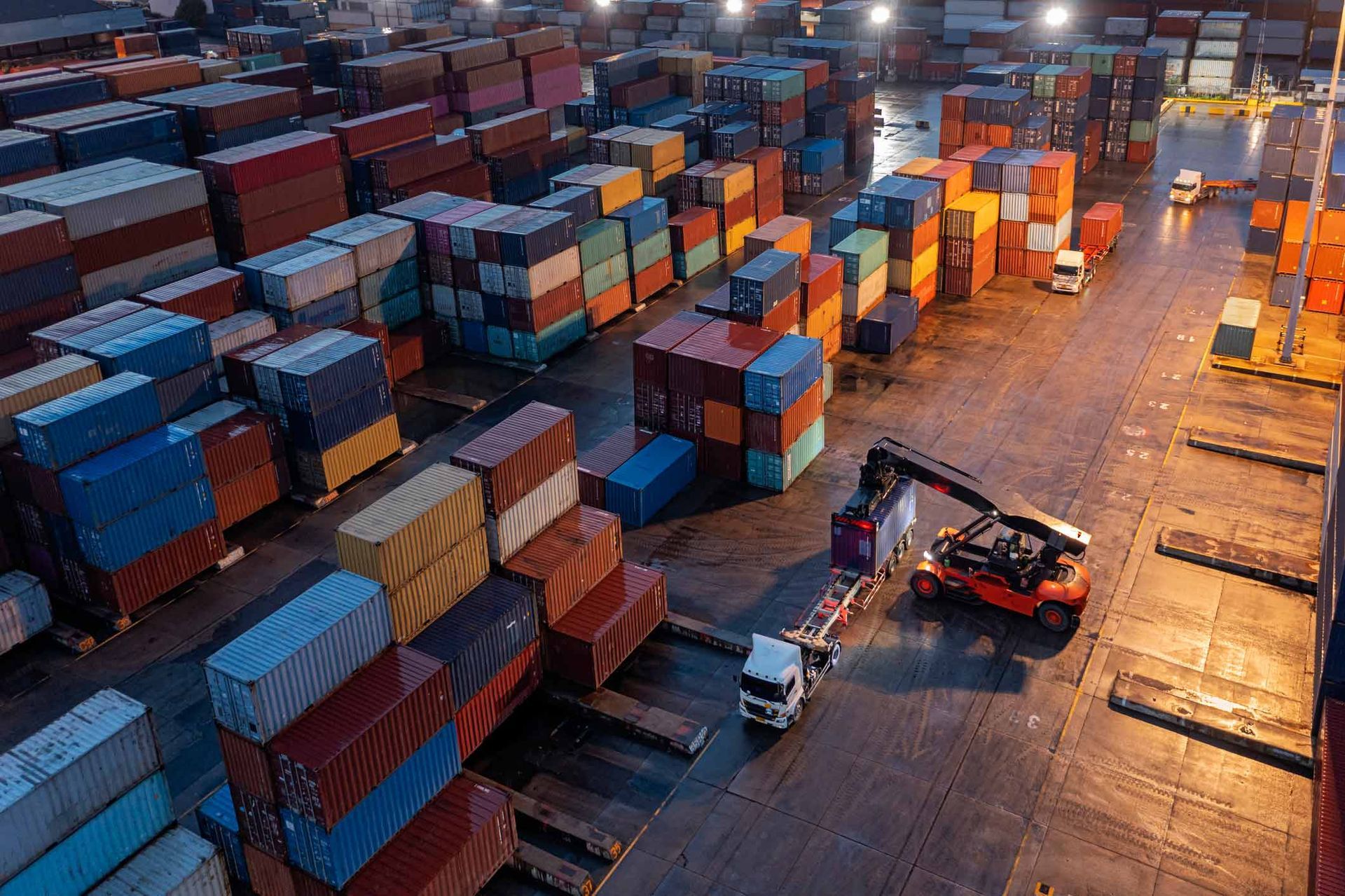 Container truck loading | Dry Creek, SA | Spectrum Transport Systems Pty Ltd