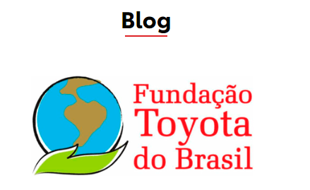 A logo for fundacao toyota do brasil with a hand holding a globe