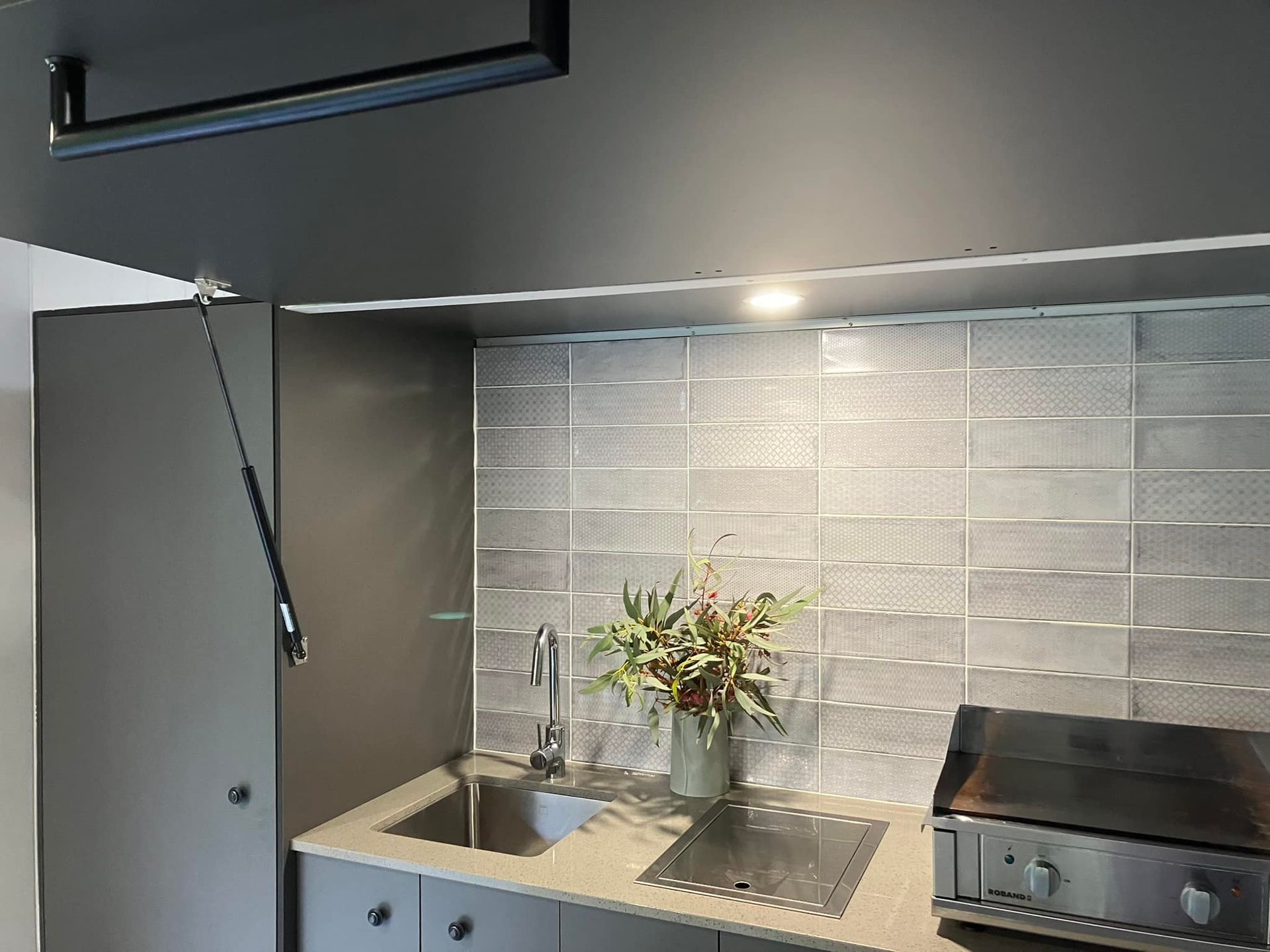 Gray Kitchenette with Sink, Stove, Backsplash, and Overhead Cabinet — Valley Cabinetmakers Pty Ltd In Biloela, QLD 