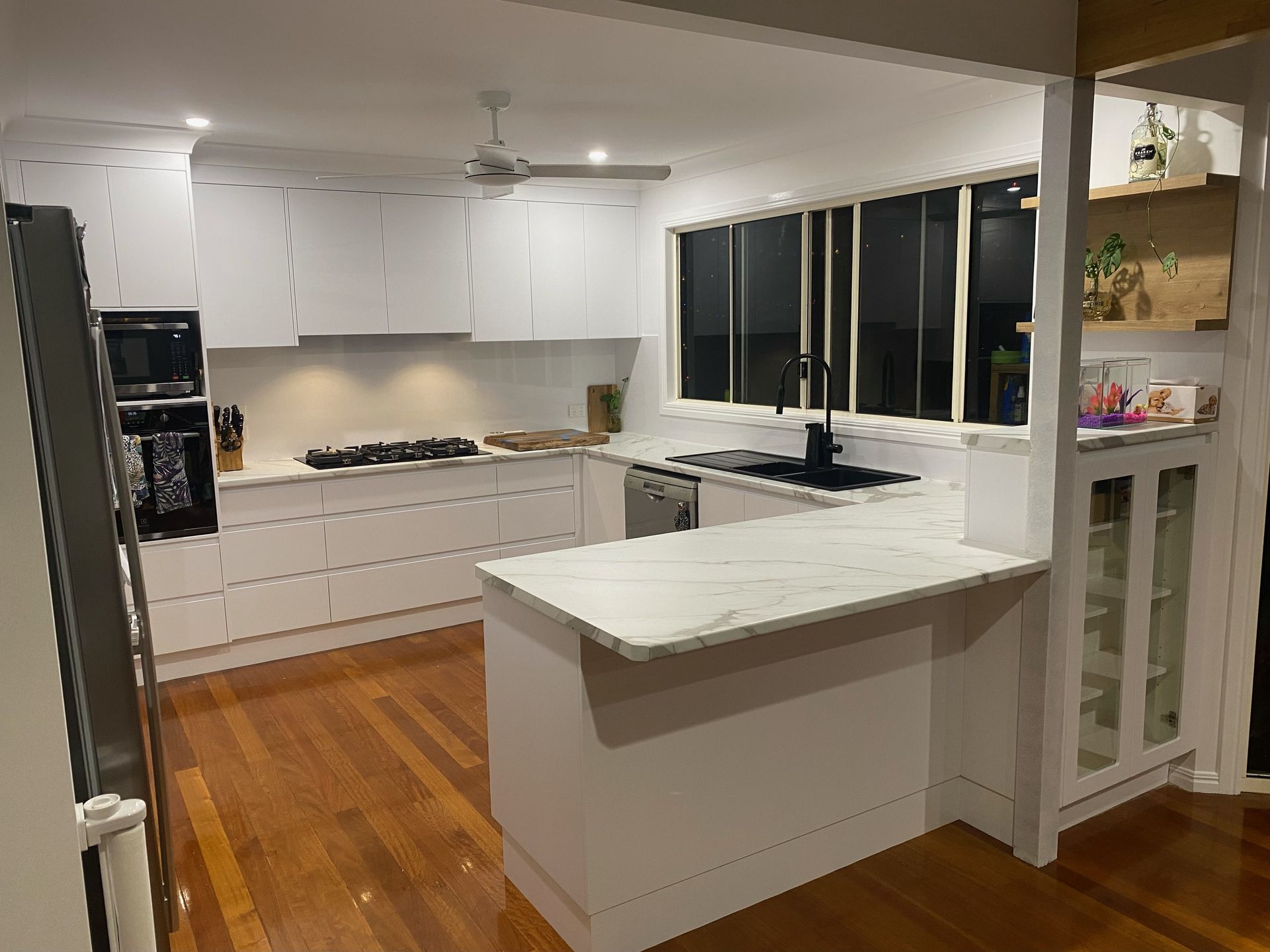 Modern White Kitchen With Island, Wood Floors — Valley Cabinetmakers Pty Ltd In Biloela, QLD