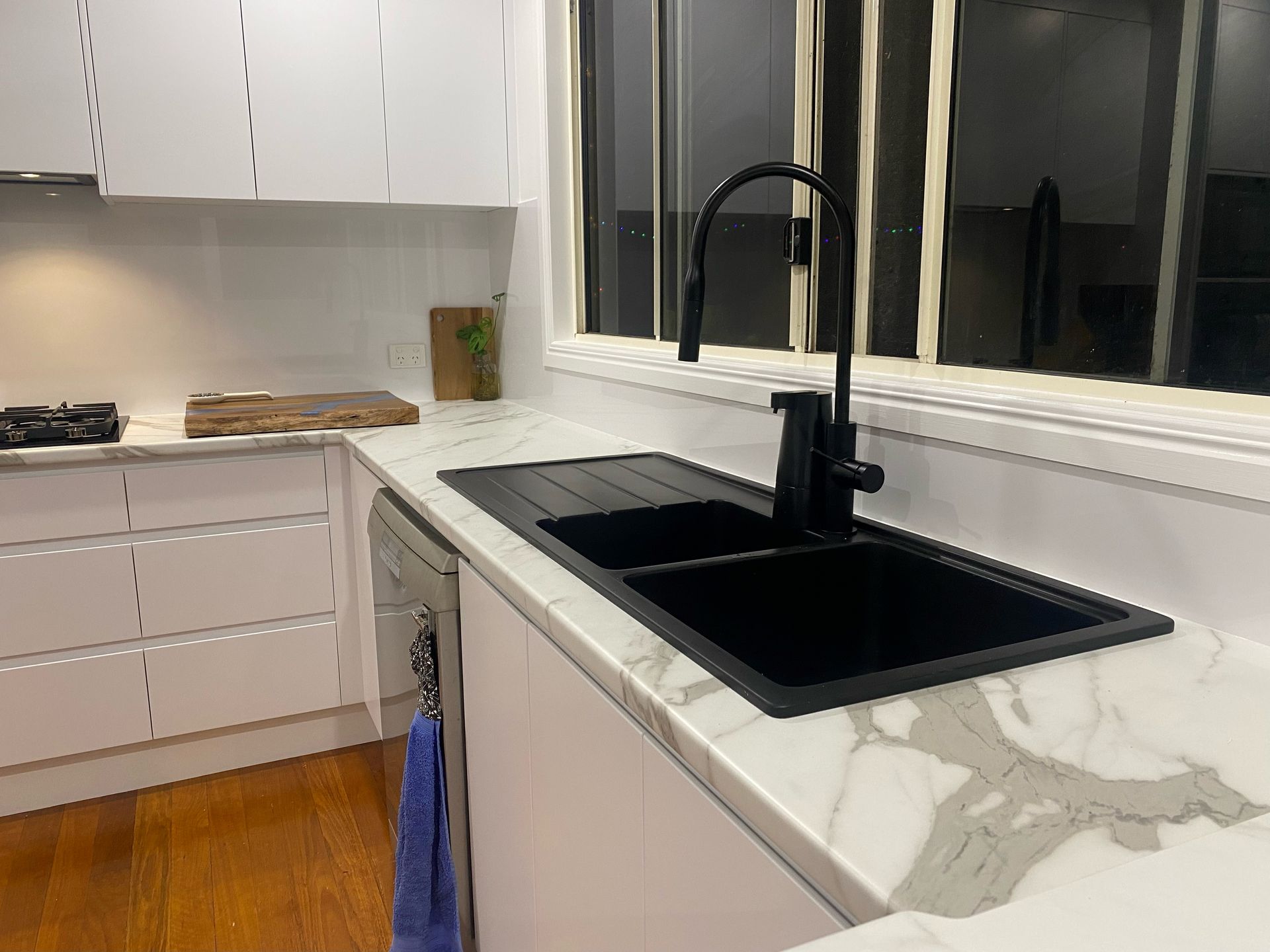 Modern Kitchen Sink With Black Faucet, White Cabinets, Marble Countertop — Valley Cabinetmakers Pty Ltd In Biloela, QLD