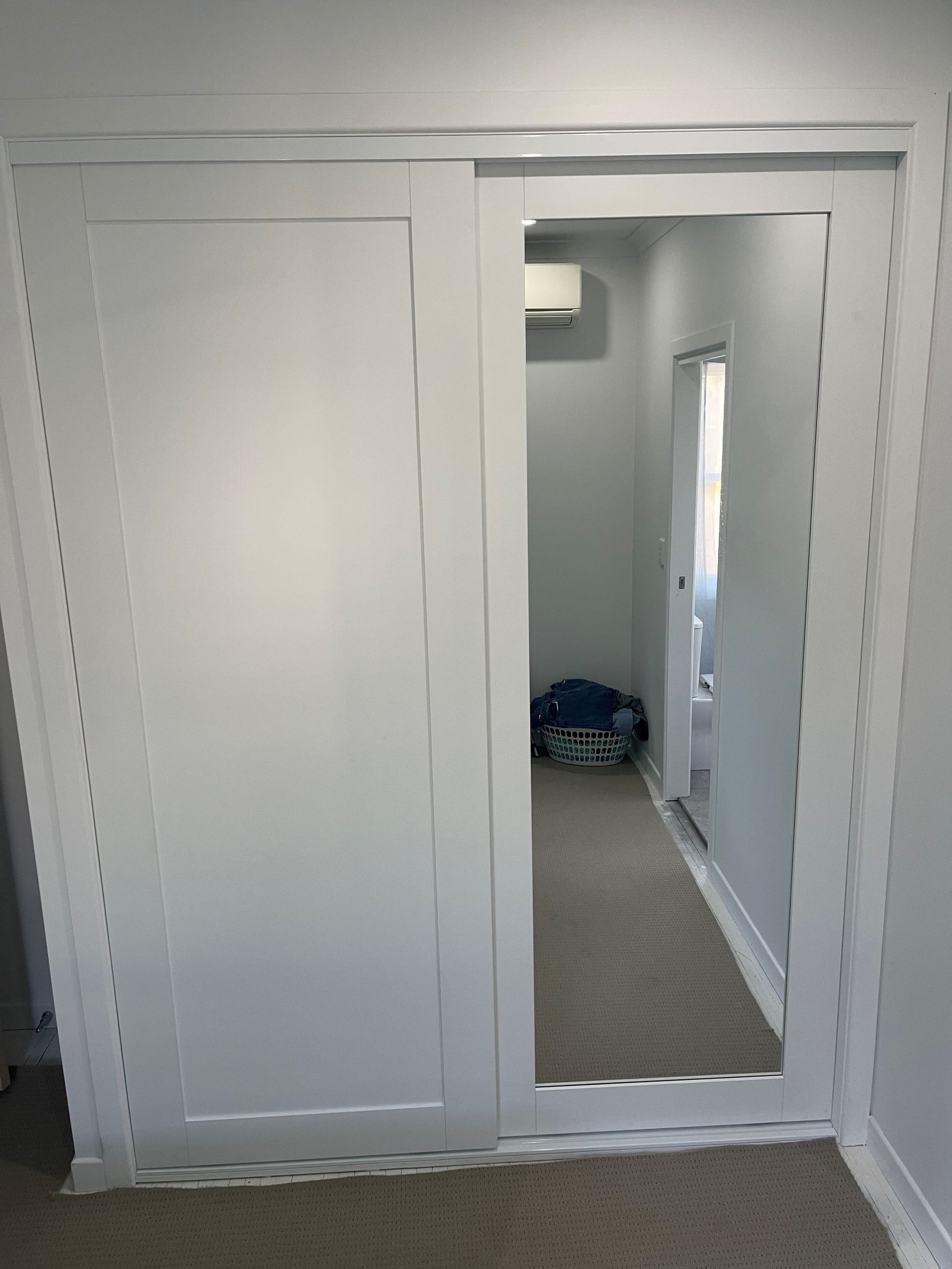 Built-in Bedroom Closet With Sliding Doors, a Mirrored Center Panel — Valley Cabinetmakers Pty Ltd In Biloela, QLD 