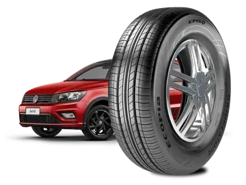 SUV vermelho atrás de um pneu e roda grandes, destacando os pneus do carro em um fundo branco.