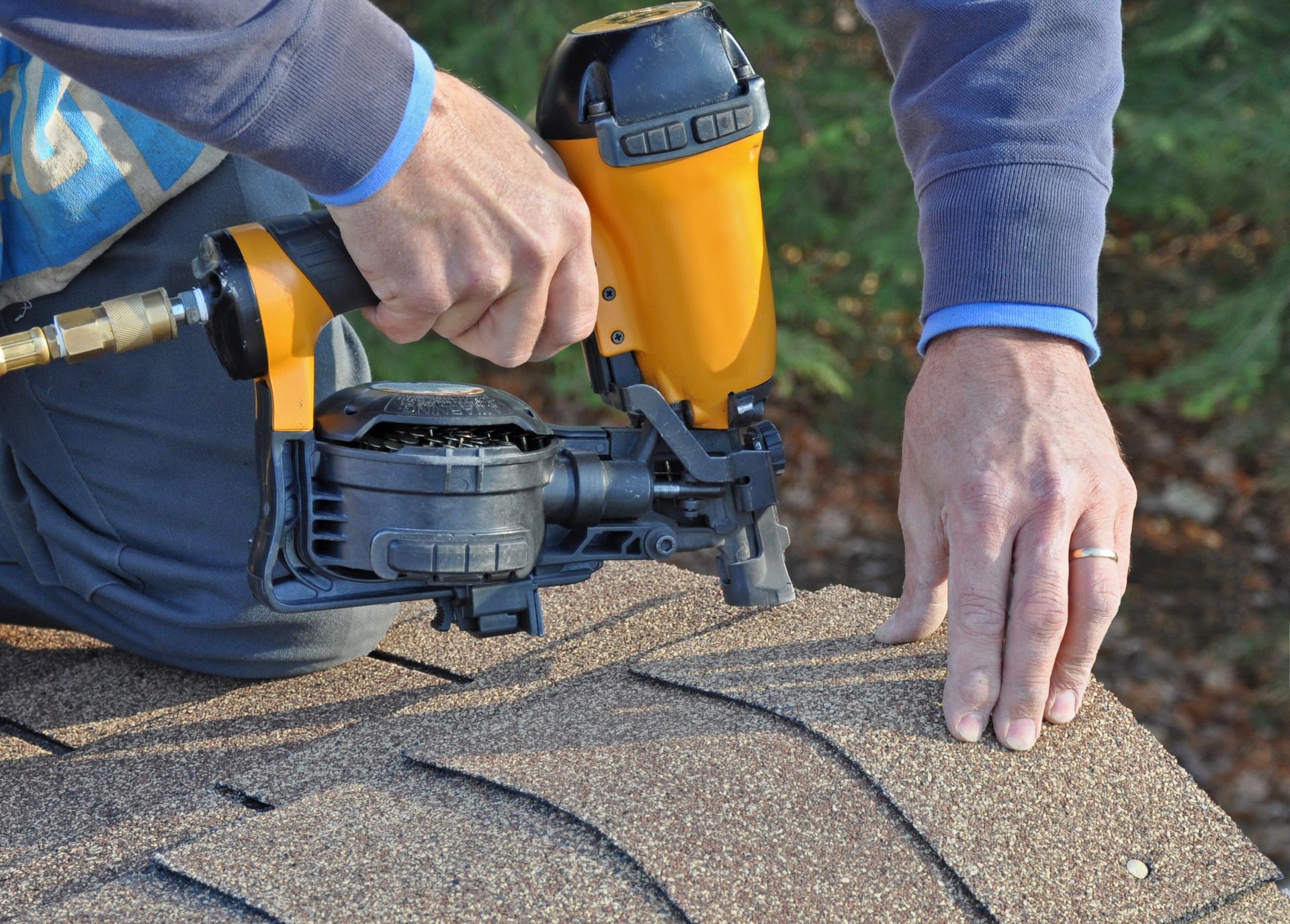 nail gun on shingles