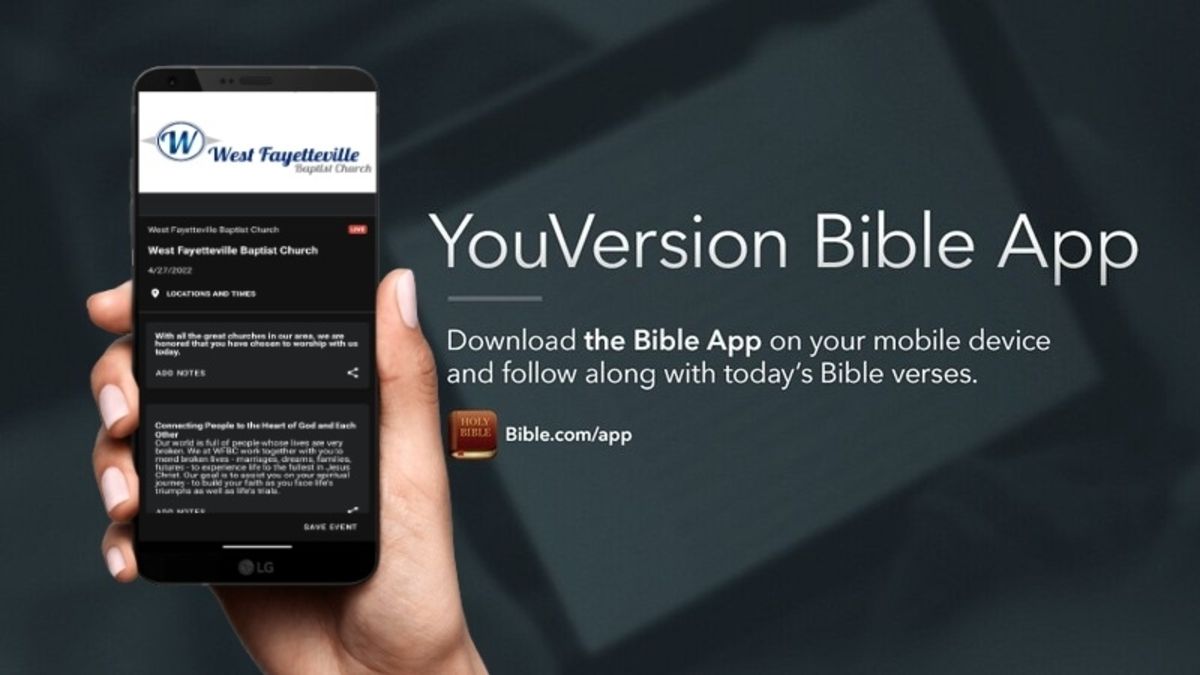 A person is holding a cell phone that says youversion bible app