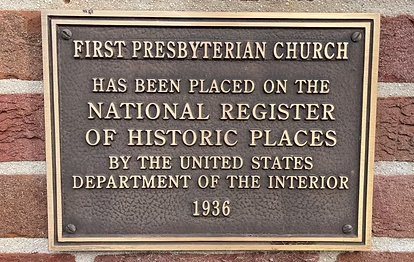 Plaque on First Presbyterian Church noting placement on the National Register of Historic Places in 1936