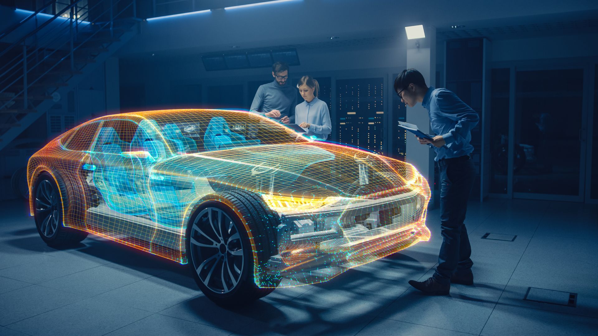 A group of people are working on a futuristic car in a garage.