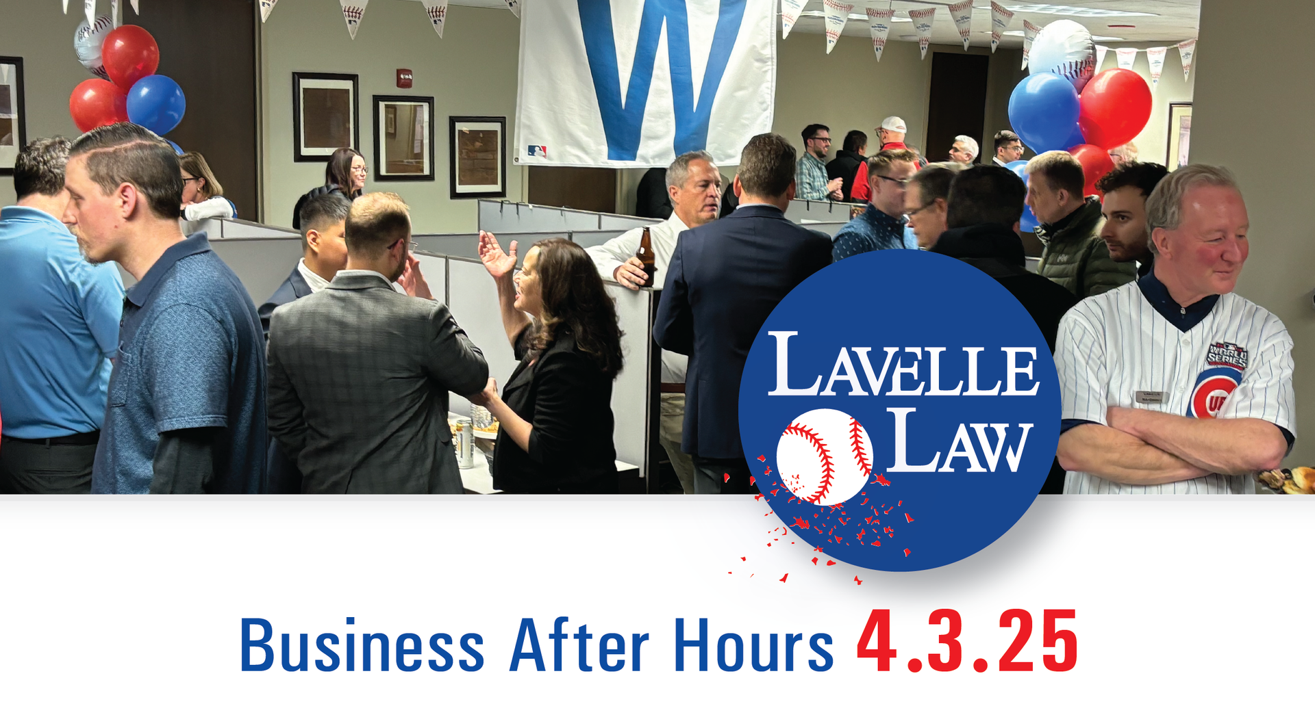 A group of people are gathered in a room with a sign that says lavelle law