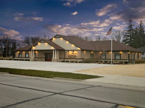 Building with a lit roofline