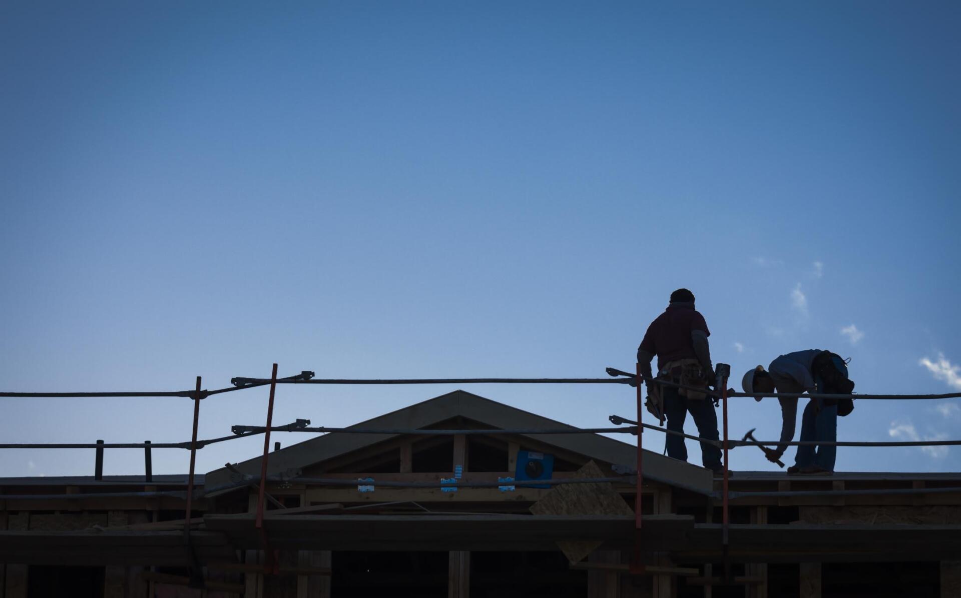 worker using a hammer