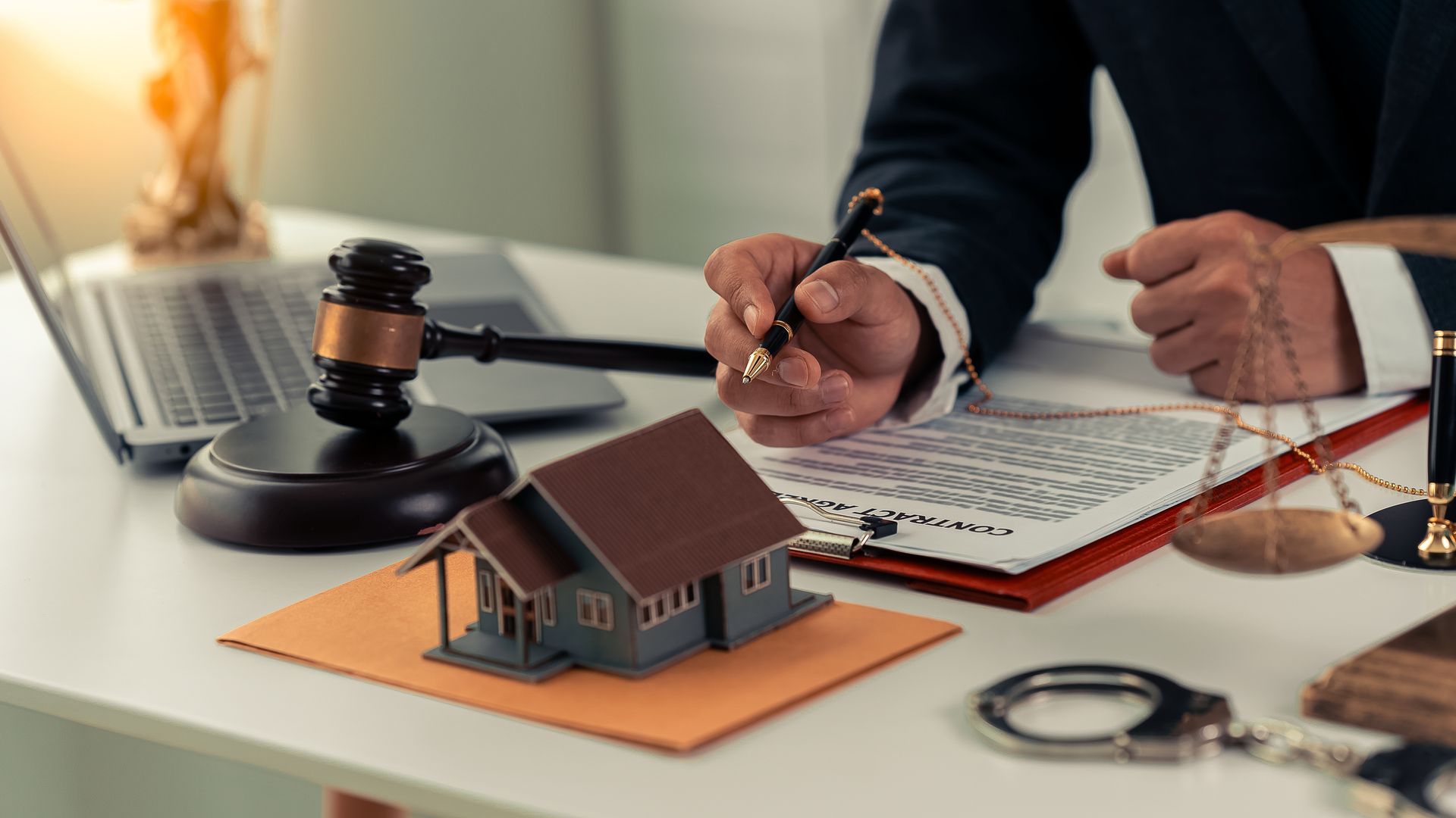 Depiction of a property tax Lawyer working on documents Depiction of a property tax Lawyer working on documents