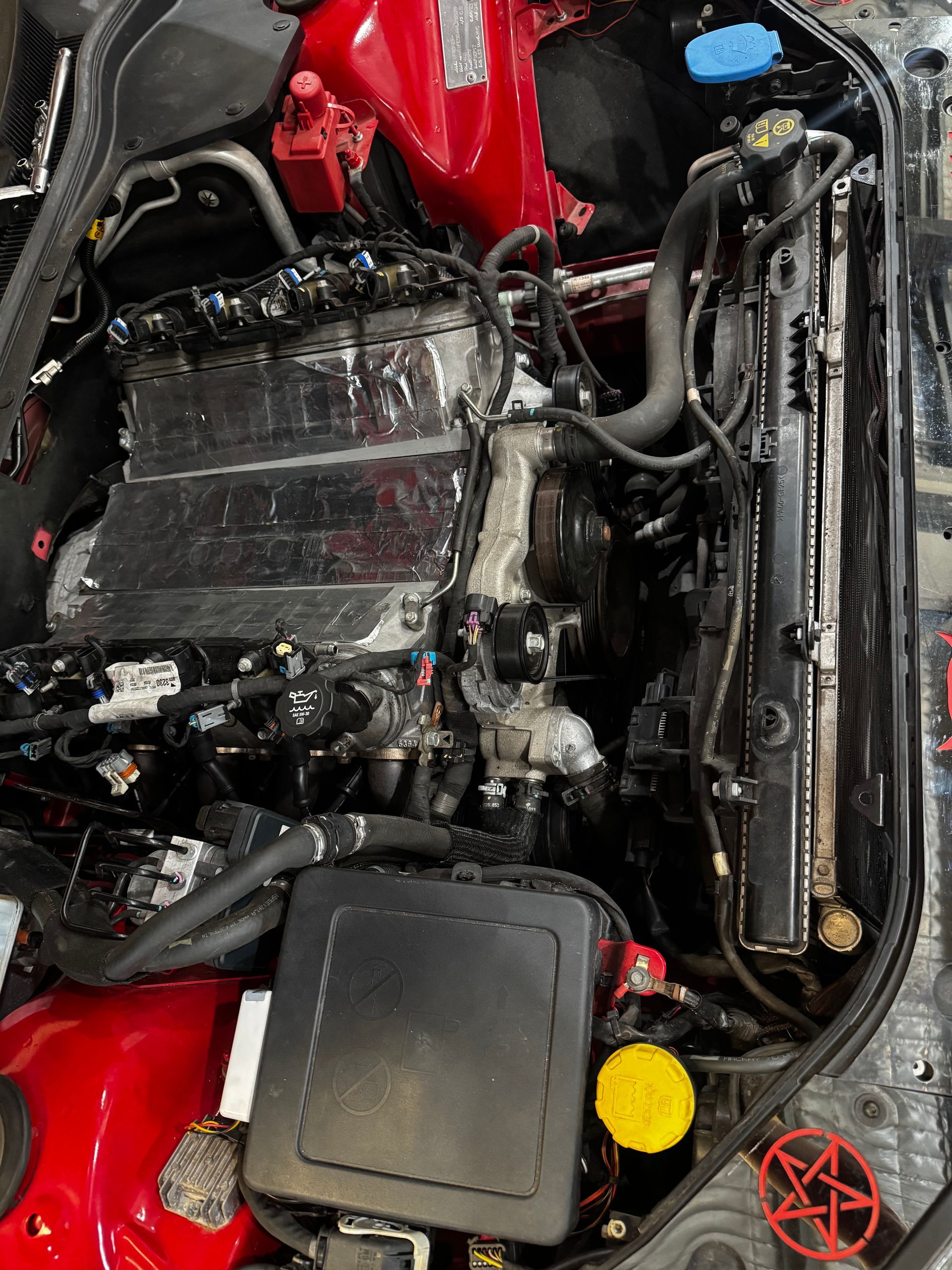 Top-down View Of An Open Car Hood Showing A Clean Engine Bay — Elite Fleet Auto - Electrics & Mechanical in Bowen, QLD