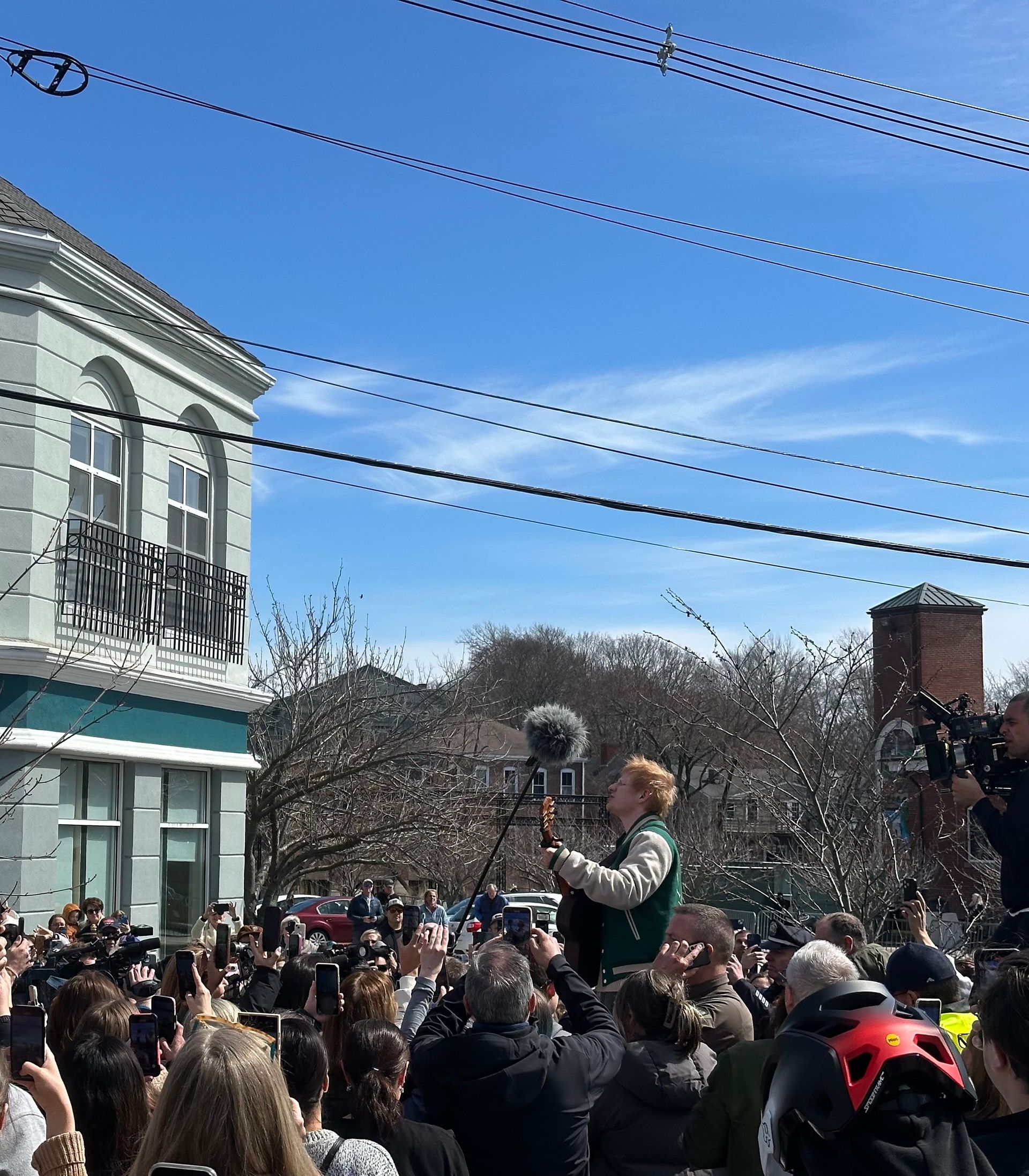 Ed Sheeran sings to a crowd in Ipswich, MA
