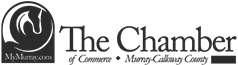 Logo for The Chamber of Commerce, Money-Glenn County, in black and gray with a circular emblem and website text
