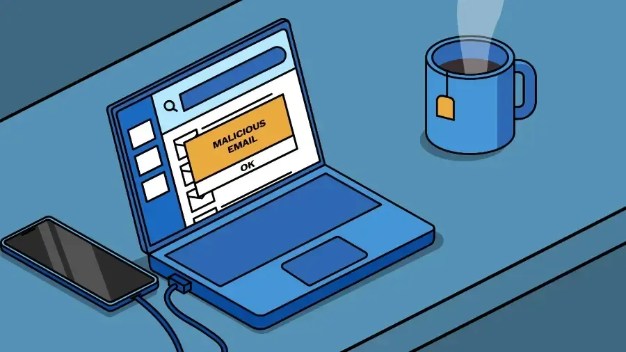 Ordinateur portable signalant un e-mail malveillant