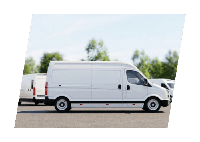 White commercial cargo van parked outdoors as part of a mobile fleet service operation.