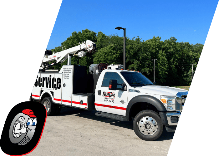 Utility service truck parked outdoors and equipped for commercial roadside repairs.