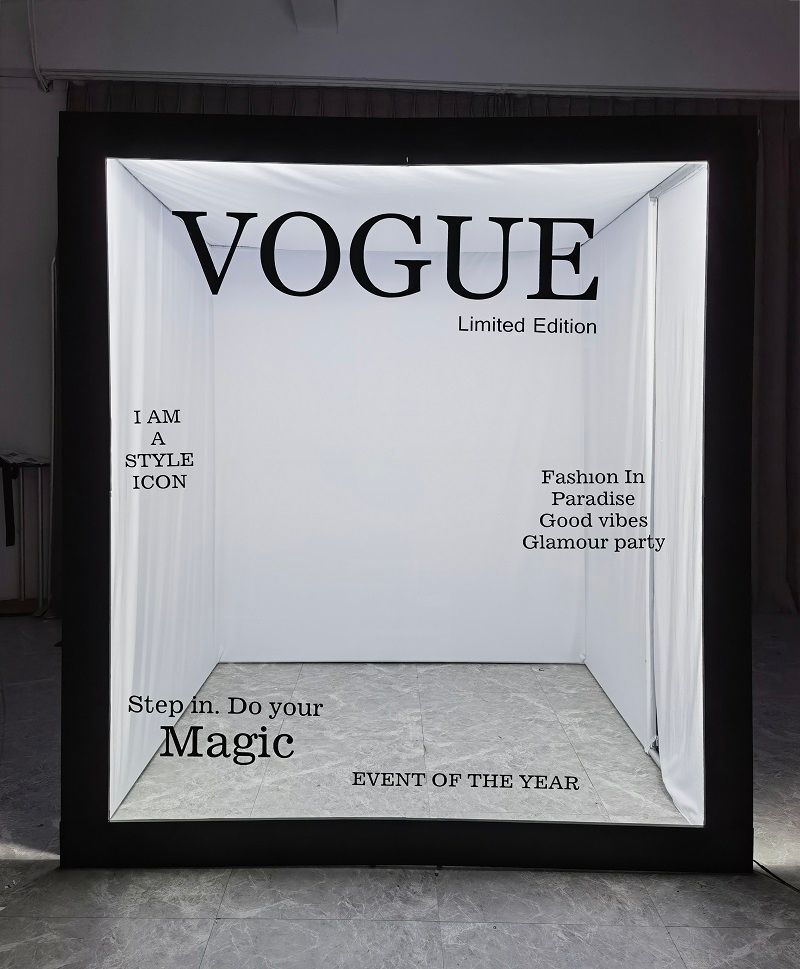 Vogue magazine cover displayed in a white gallery-style frame against a dark wall.