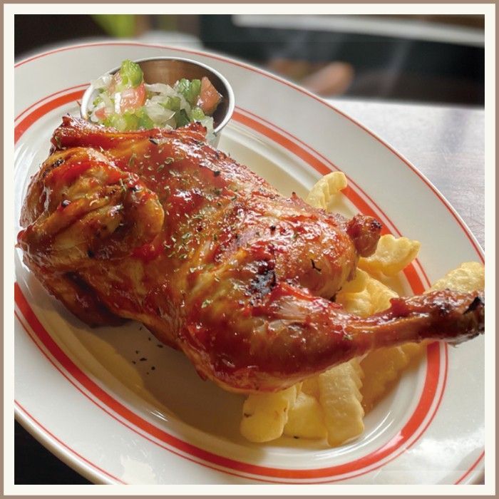 BBQ half-chicken on a plate