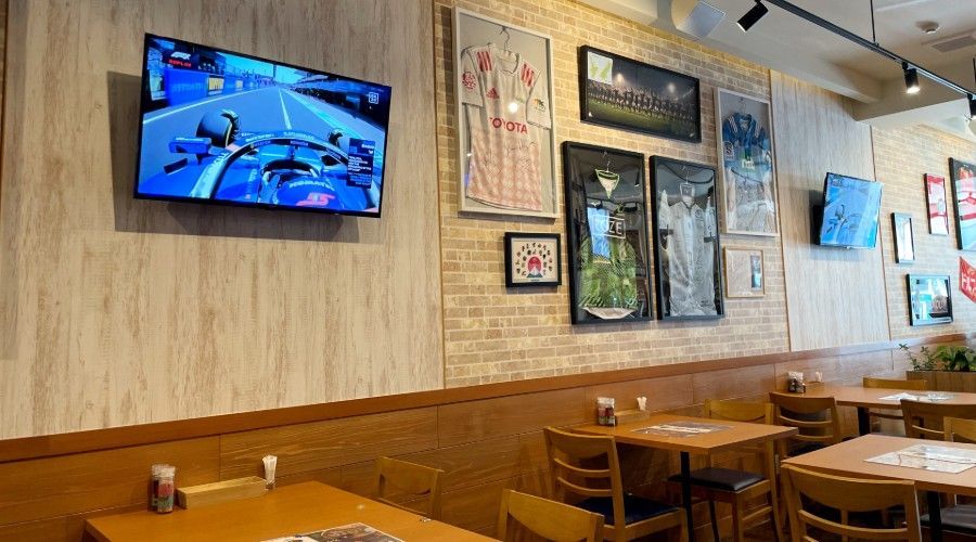 F1 Japan Grand Prix being shown on a TV screen at The Hungry Moose sports bar in Nagoya.