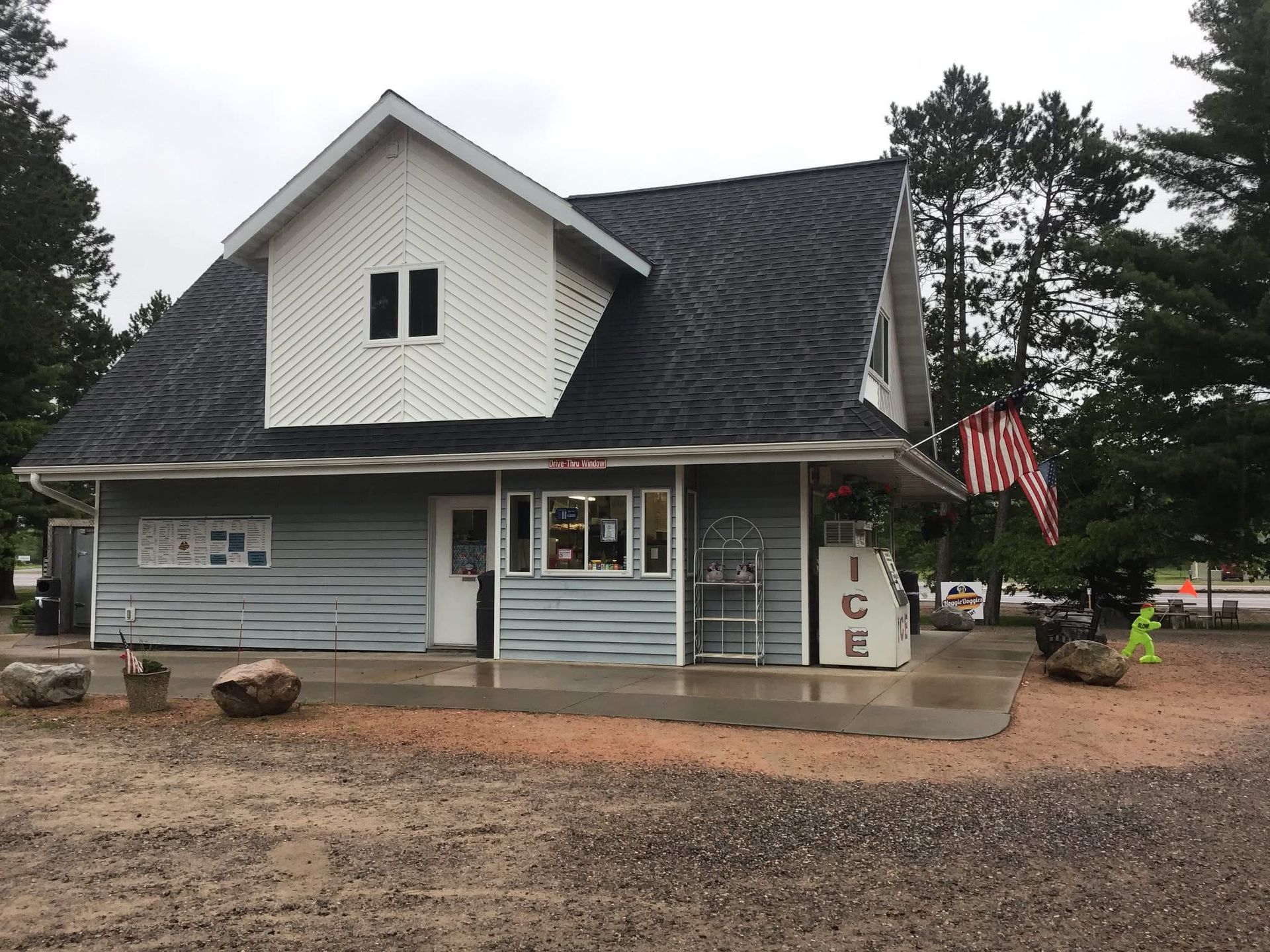 Lakeland Roofing crew completing an asphalt shingle roof replacement in Northern Wisconsin.
