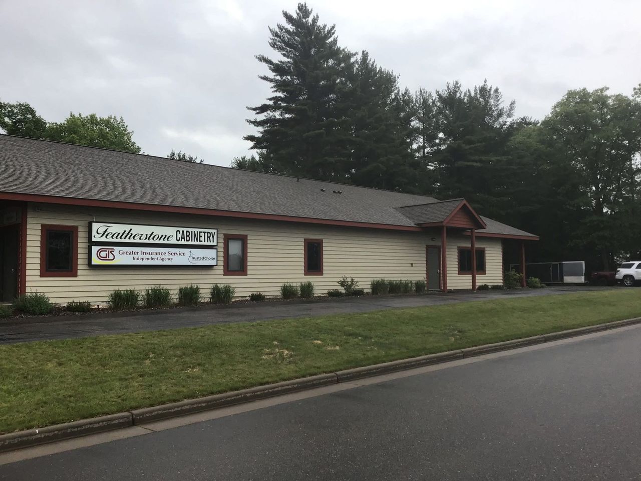 Lakeland Roofing family-owned crew at a completed residential roofing project in Minocqua, WI.