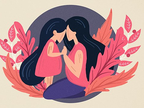 A mother and daughter are sitting next to each other and touching their foreheads.