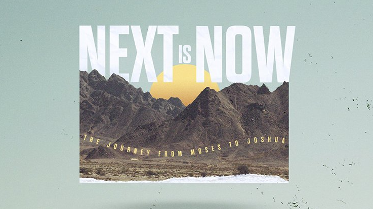 A poster that says next is now with mountains in the background