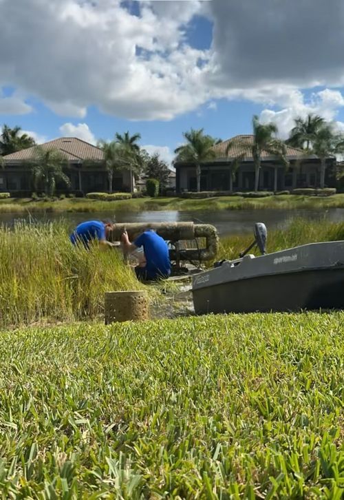 A technician performing installation on fountain equipment.