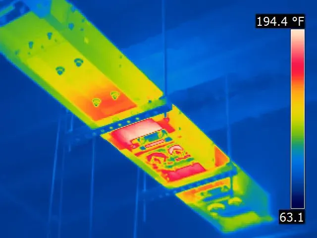 A thermal image shows hot spots on a bus duct