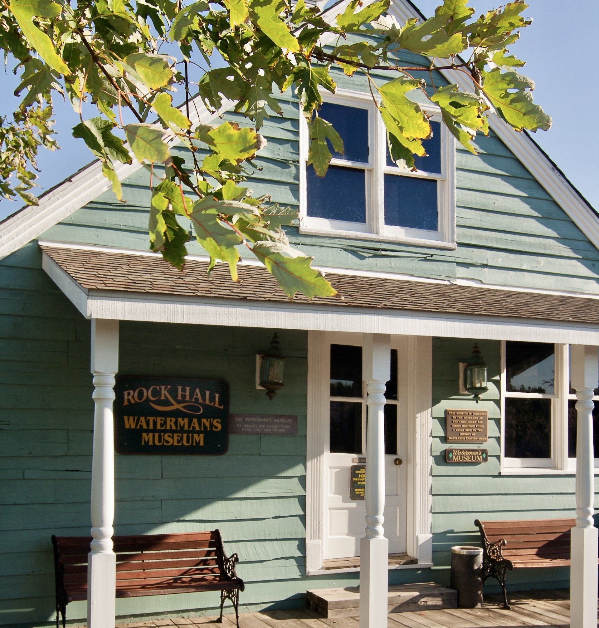The front facade of a small building located in Rock Hall, Maryland
