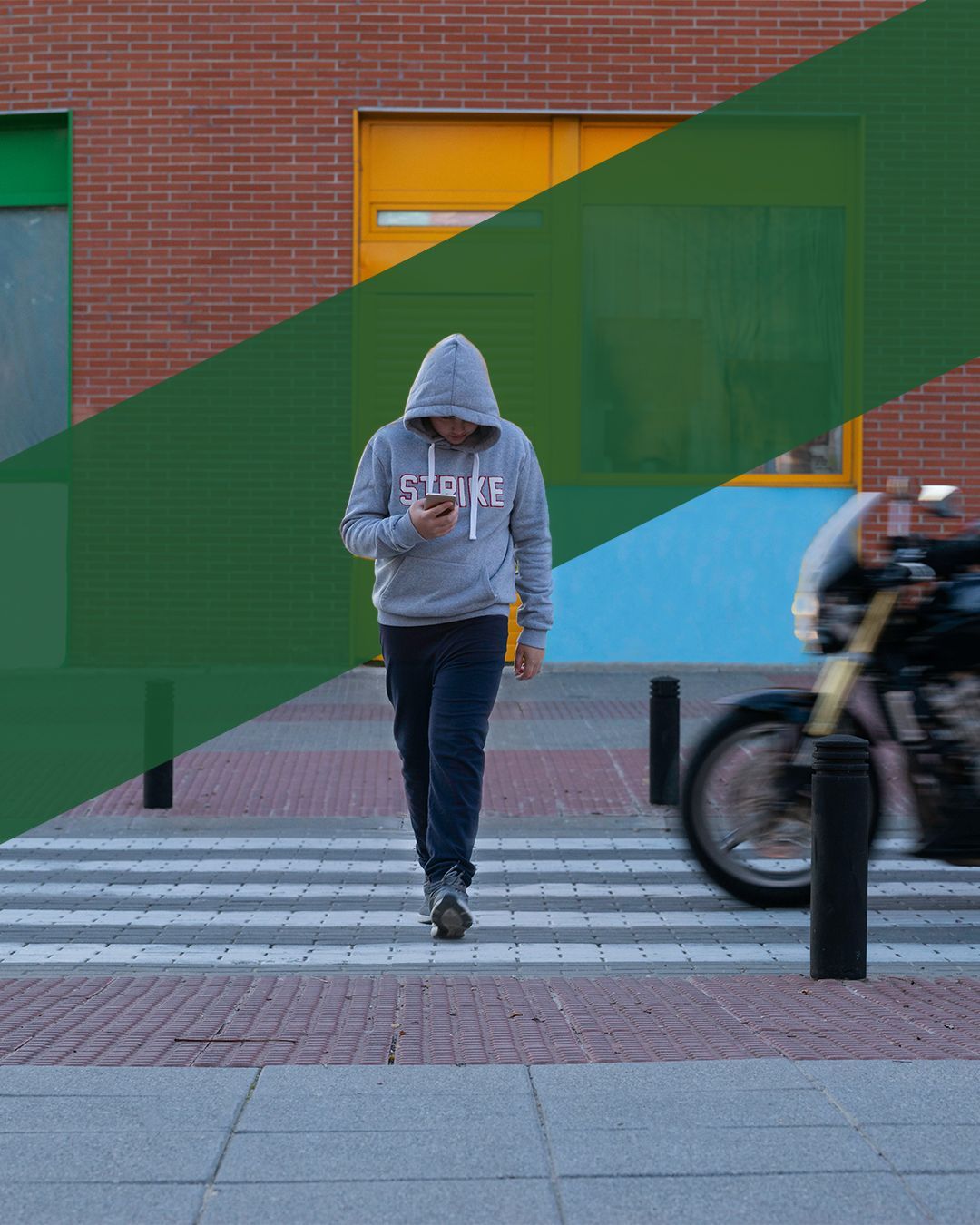 Inattentive pedestrian crossing the street