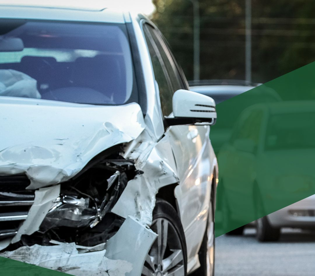 white sedan after a car accident