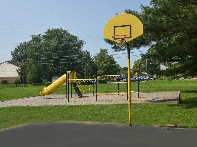 Yellow playground with a slide and basketball hoop in a grassy community park. Contact us today to learn more about our pet-friendly 1, 2, 3, and 4-bedroom apartments for rent in Bethlehem, PA. At River Pointe Townhomes, you’ll enjoy a prime location near Lehigh River and all the amenities and extras that make your life comfortable. We can’t wait to welcome you home!