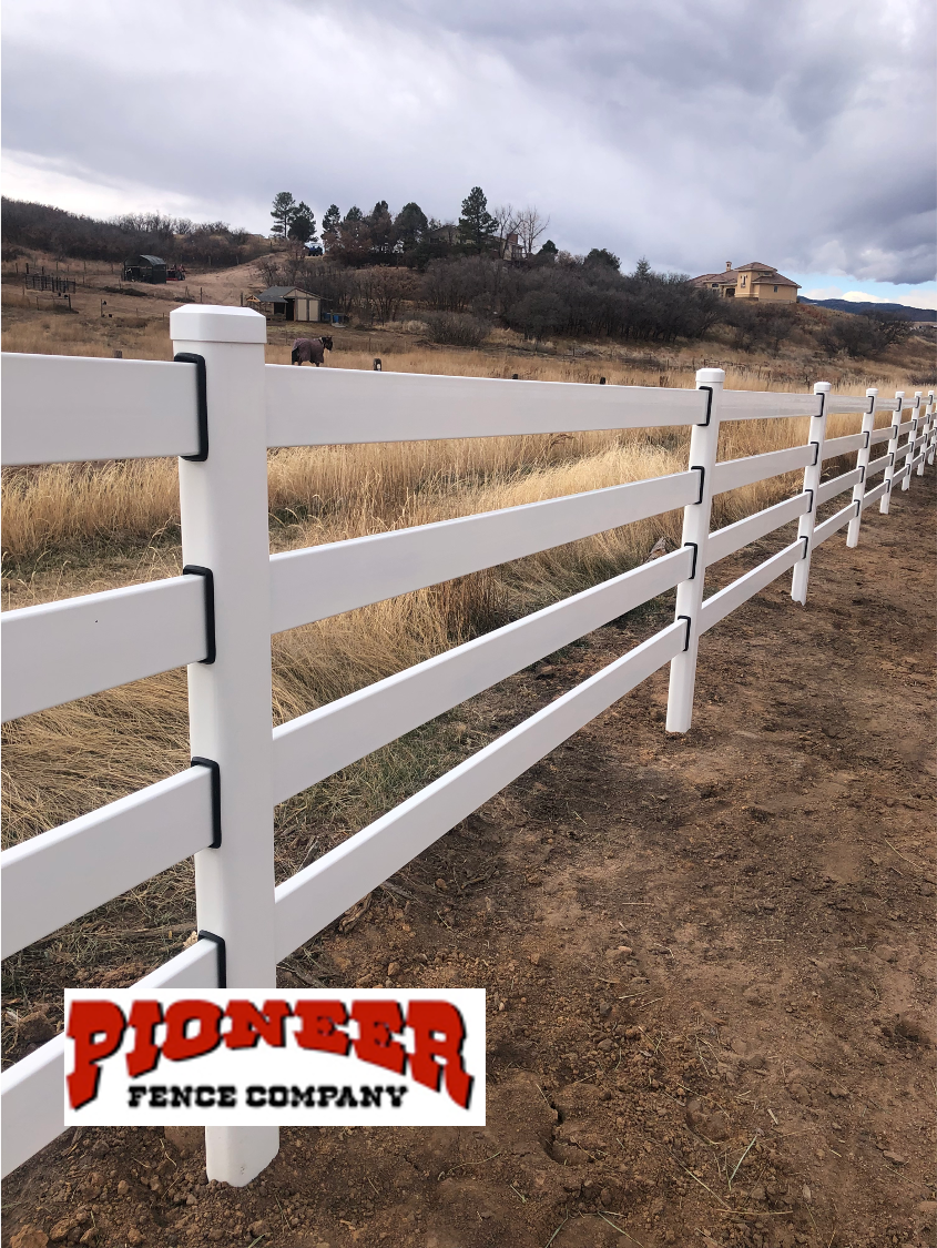 A white fence with the word pioneer on it