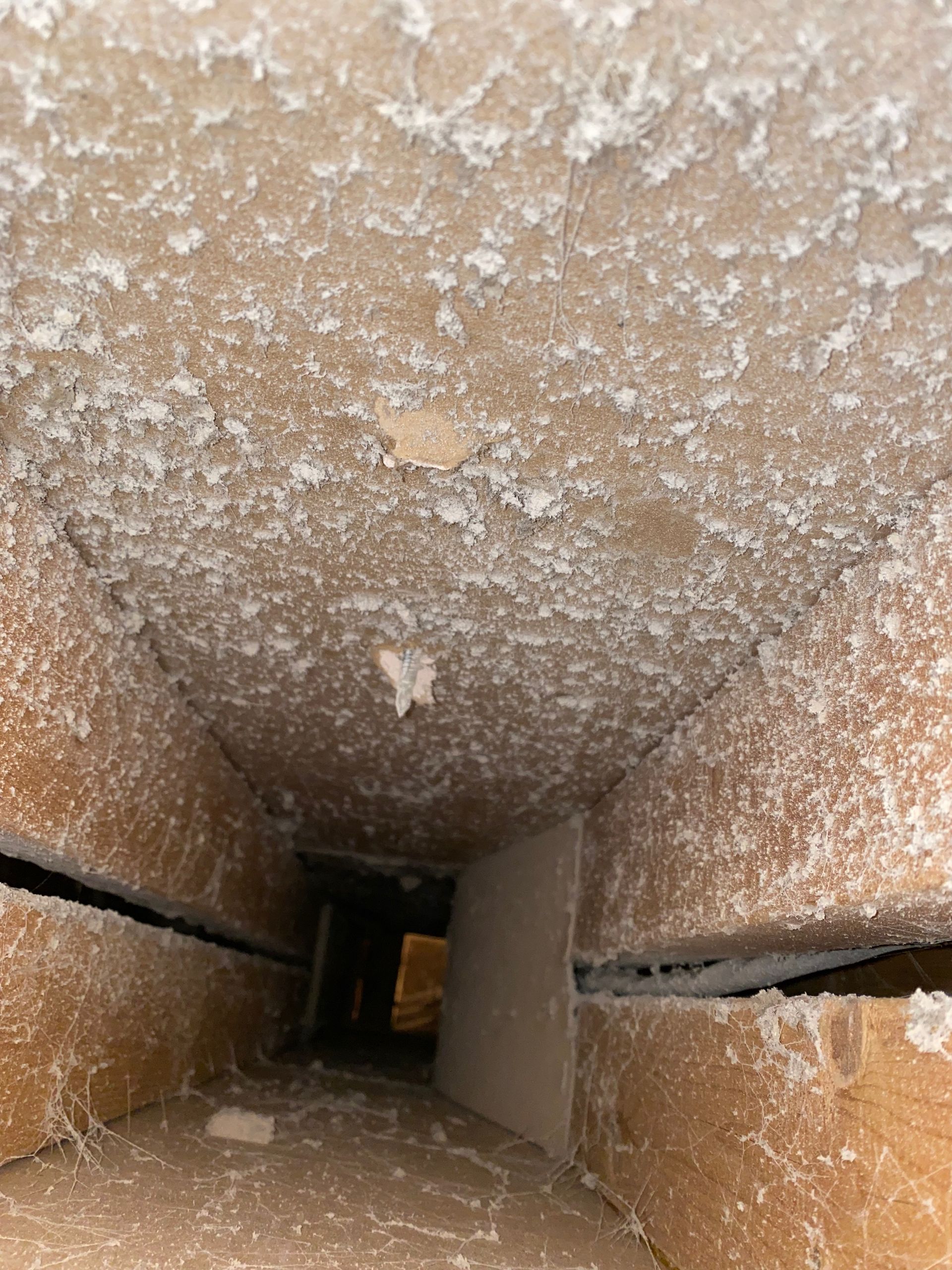 The inside of a building with a lot of dust on it