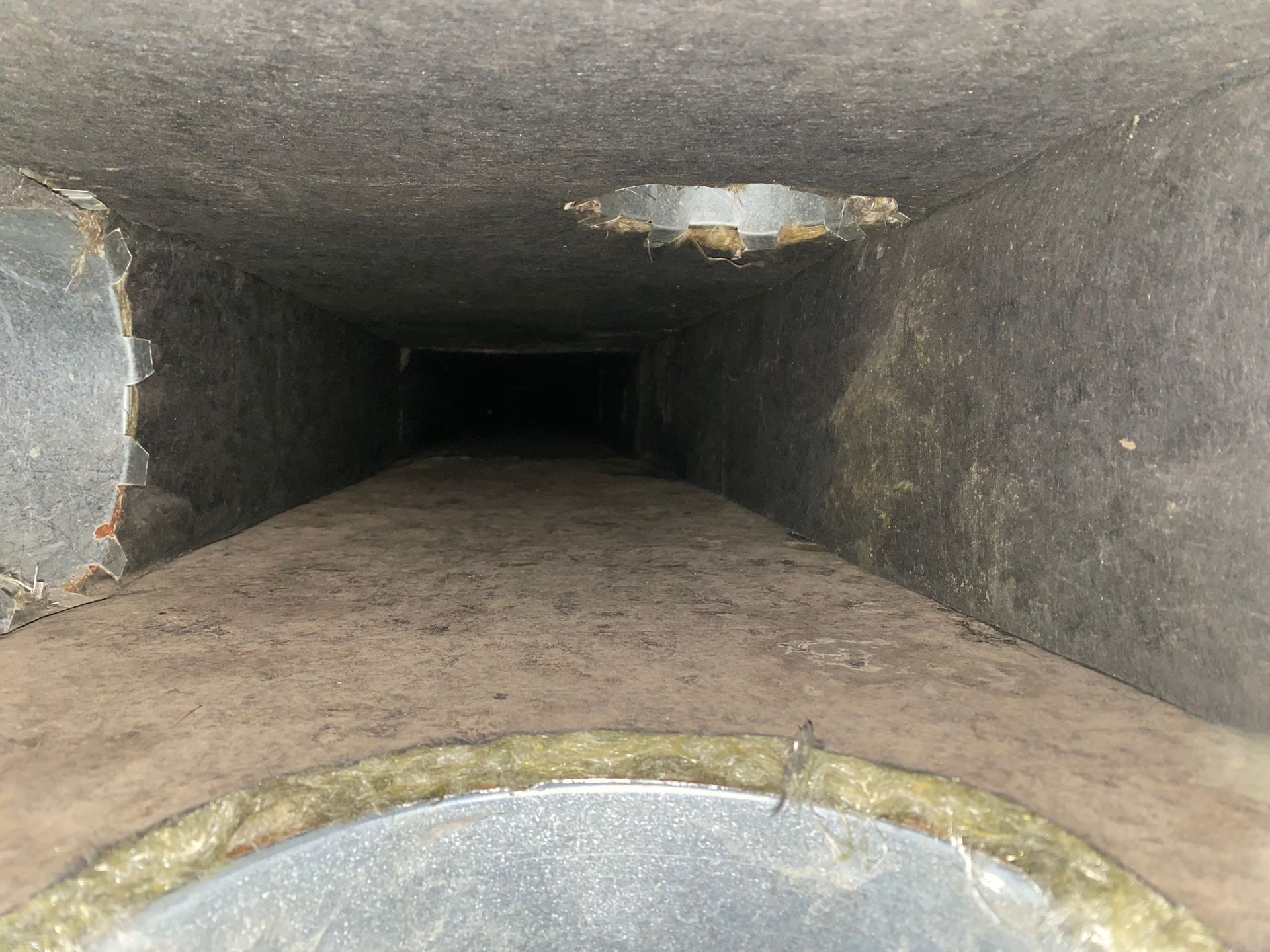 A tunnel with a hole in the middle of it